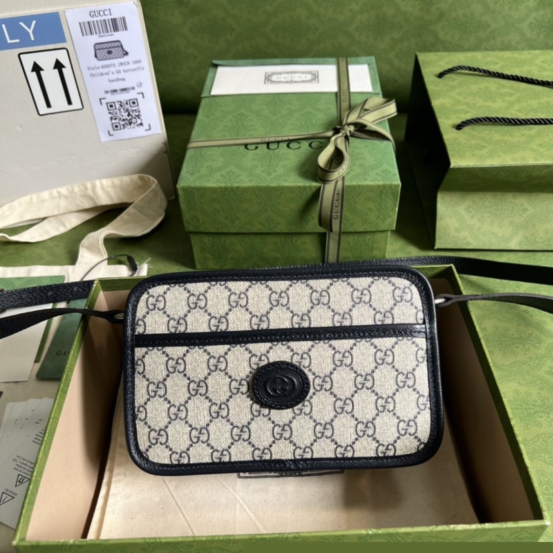 G*u*i clutch bags